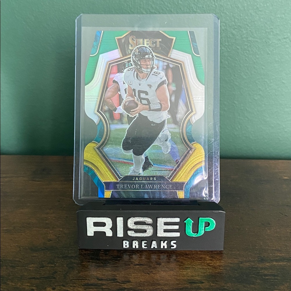 2022 Panini Select #145 Trevor Lawrence Green and Yellow Prizm Die Cut.
